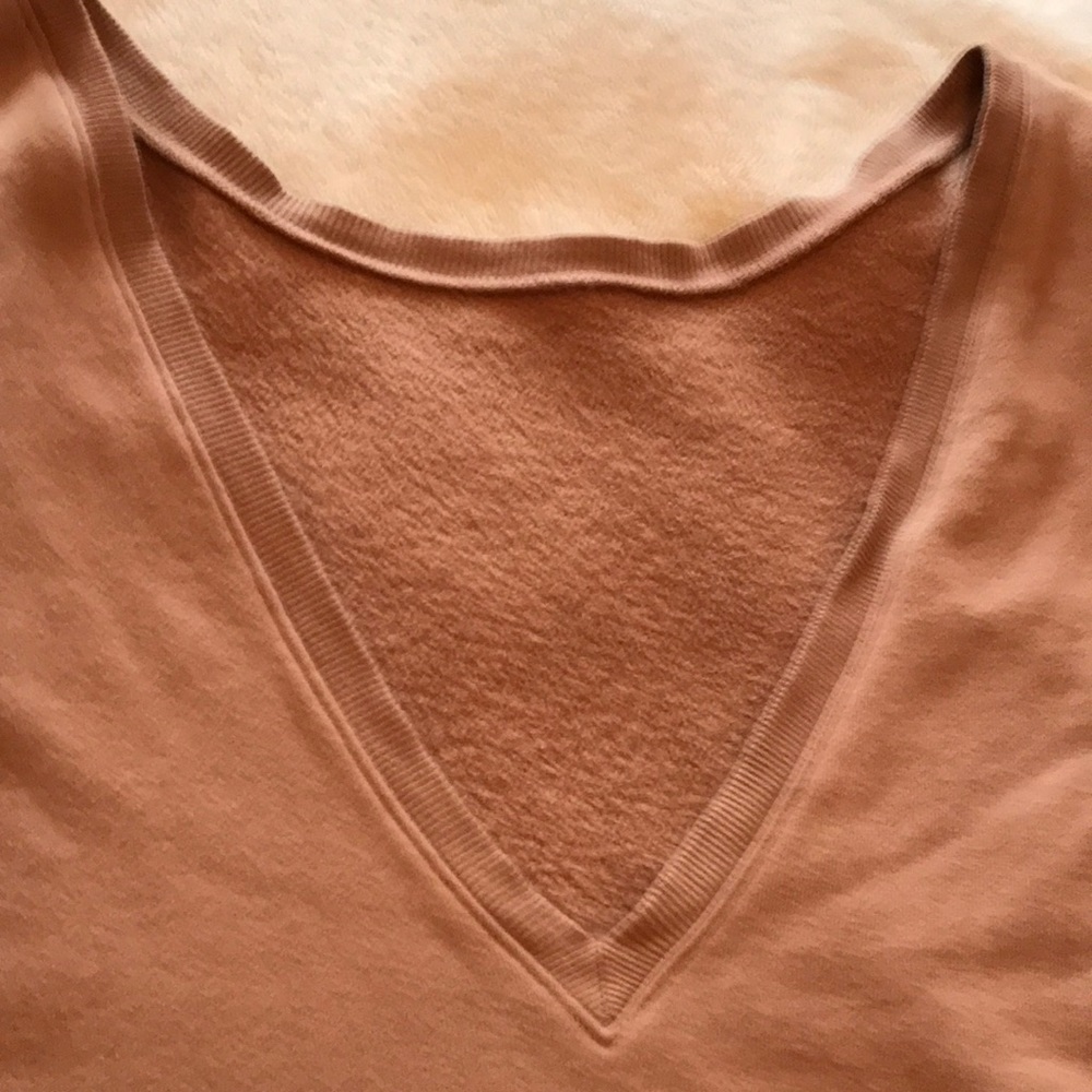 Long sleeve the top. Can be worn with a V in the front or the back
